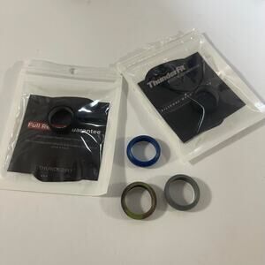 Men's silicon wedding rings bands various colors all included is what is shown
